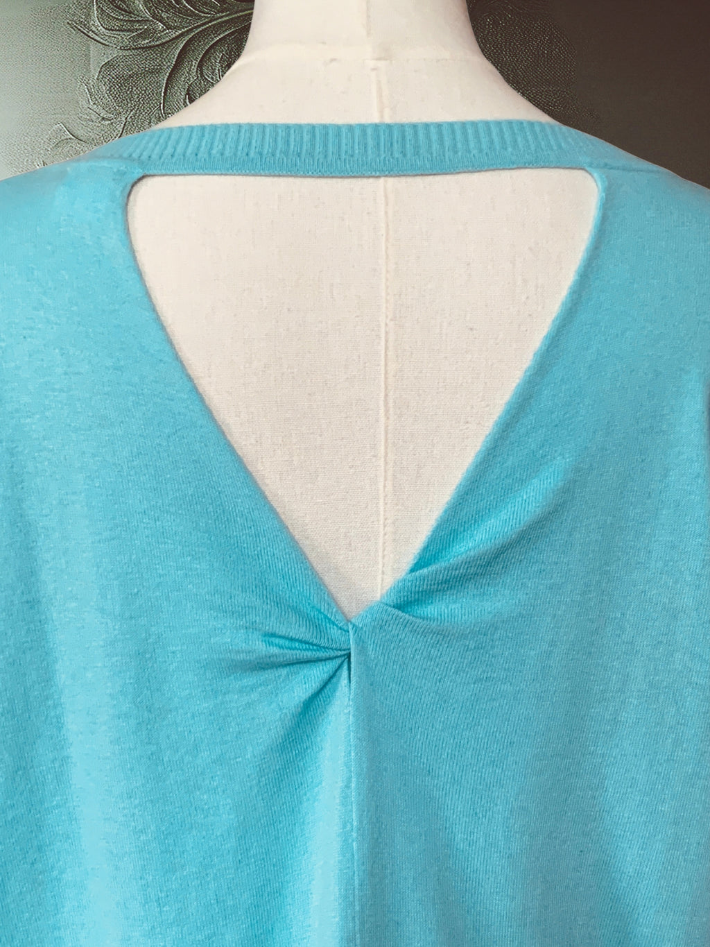 Baby blue cotton-silk sweater with a back neckline